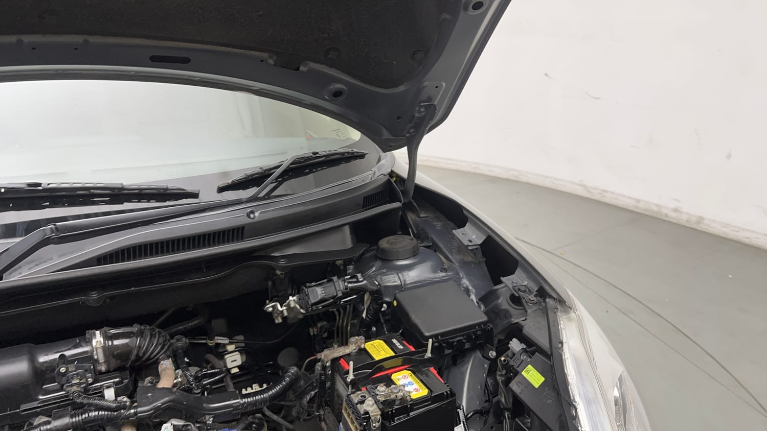Used 2022 Maruti Suzuki Dzire LXi Petrol Manual engine ENGINE LEFT SIDE HINGE & APRON VIEW