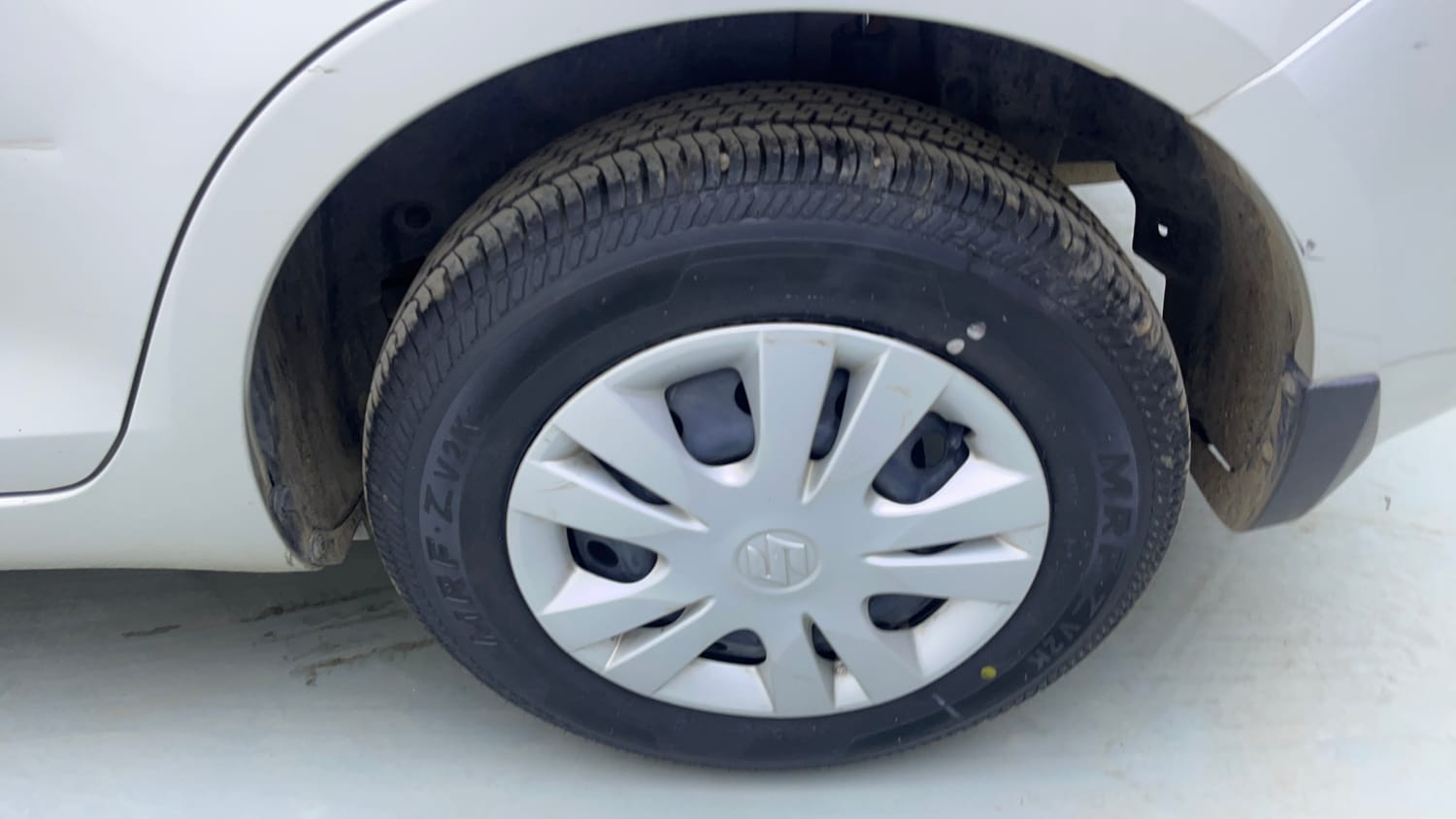 Used 2014 Maruti Suzuki Swift Dzire VXI Petrol Manual tyres LEFT REAR TYRE RIM VIEW