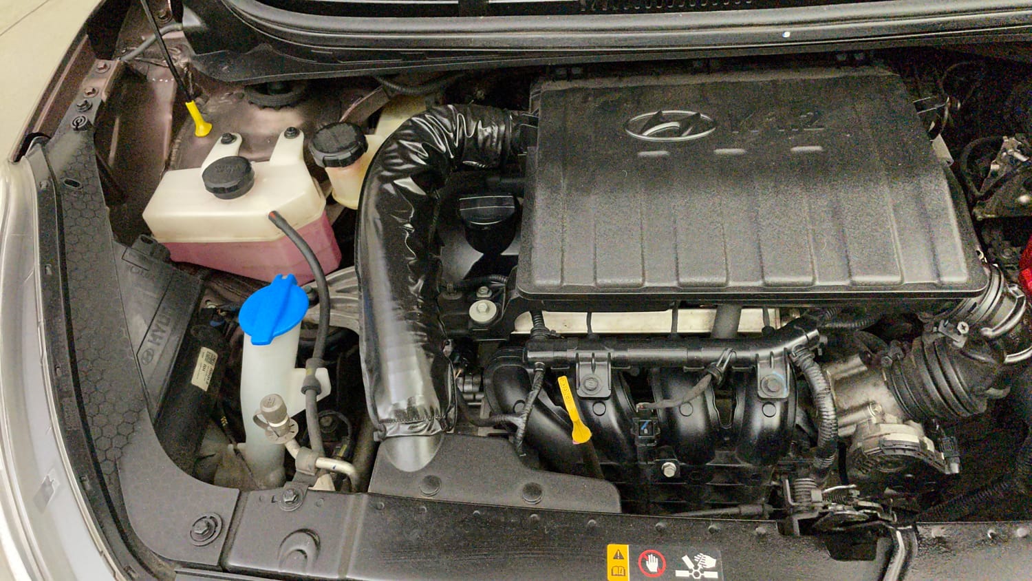 Used 2022 Hyundai Aura SX Plus 1.2 AMT Petrol Petrol Automatic engine ENGINE RIGHT SIDE VIEW