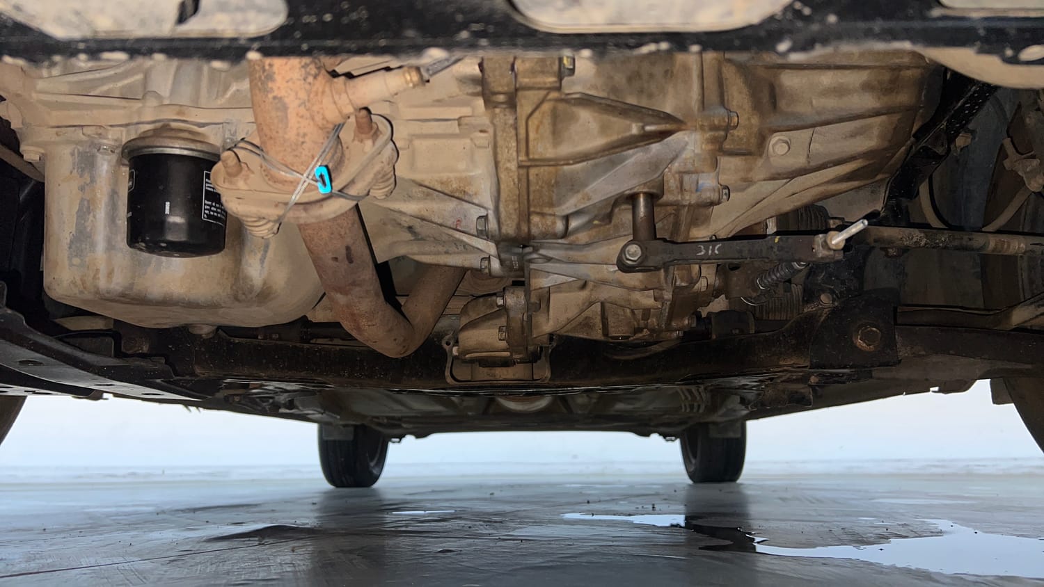 Used 2021 Maruti Suzuki Baleno Delta Petrol+CNG (Outside Fitted) Cng Manual extra FRONT LEFT UNDERBODY VIEW