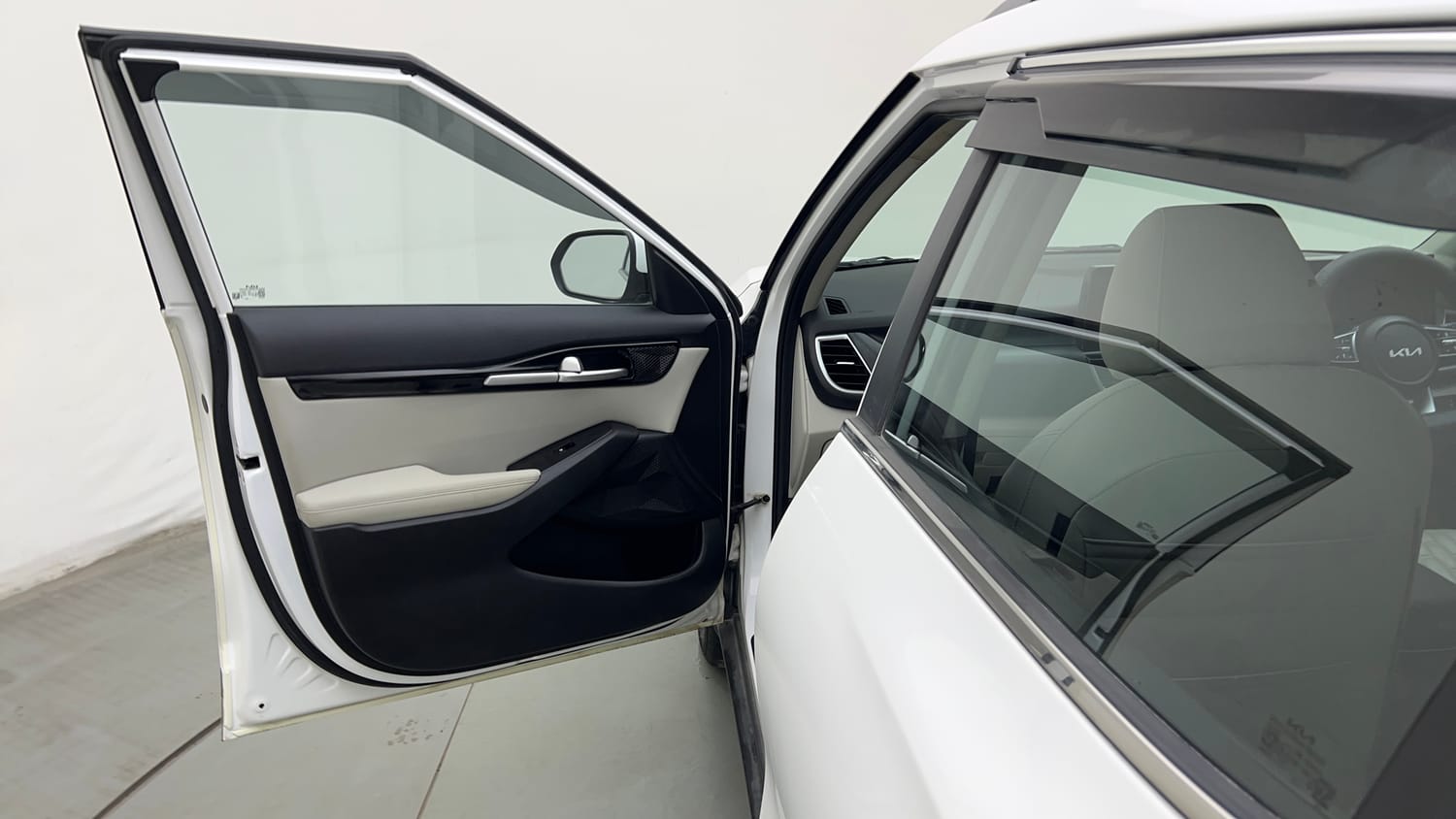 Used 2023 Kia Seltos HTX 1.5 Petrol Manual interior LEFT FRONT DOOR OPEN VIEW