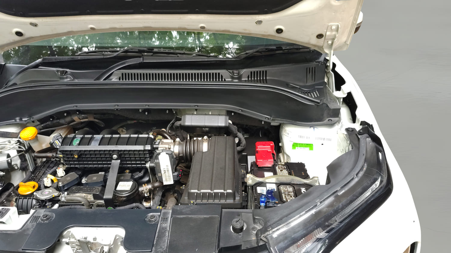 Used 2024 Tata Punch Adventure MT Petrol Manual engine ENGINE LEFT SIDE HINGE & APRON VIEW