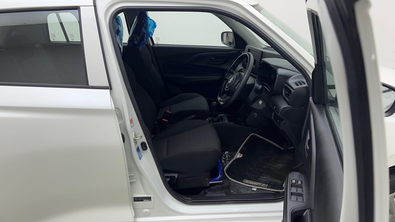 Used 2025 Maruti Suzuki Swift LXi Petrol Manual interior RIGHT SIDE FRONT DOOR CABIN VIEW