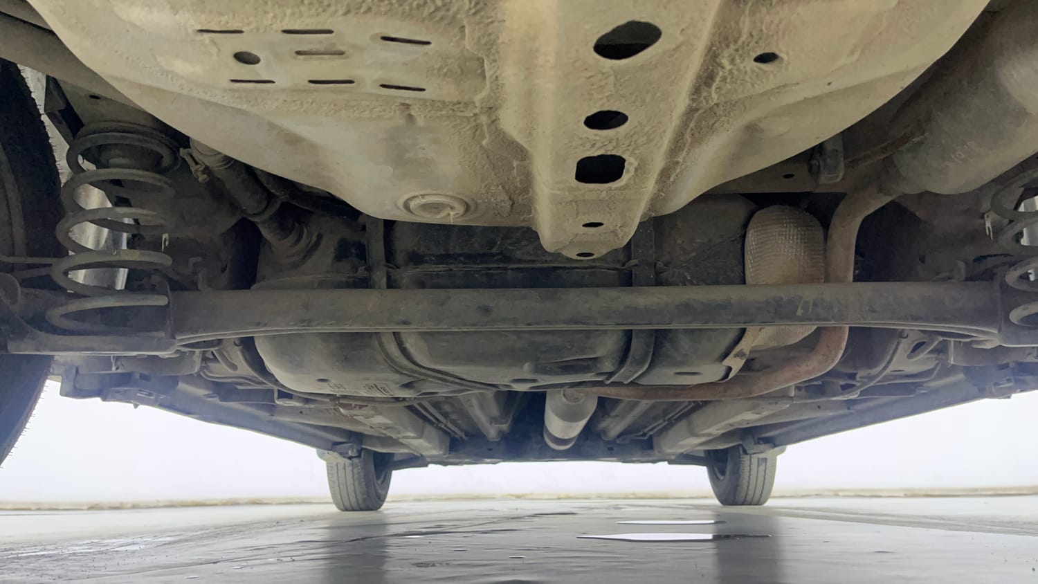 Used 2014 Maruti Suzuki Swift Dzire VXI Petrol Manual extra REAR UNDERBODY VIEW (TAKEN FROM REAR)