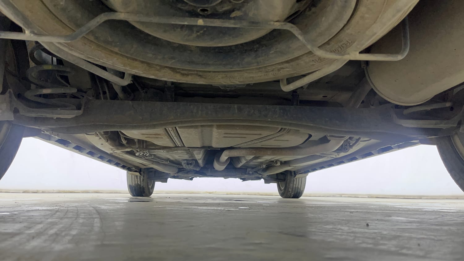 Used 2022 Maruti Suzuki XL6 Alpha MT Petrol Petrol Manual extra REAR UNDERBODY VIEW (TAKEN FROM REAR)