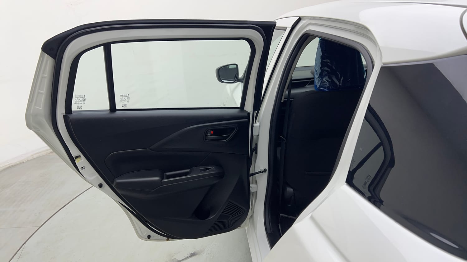 Used 2025 Maruti Suzuki Swift LXi Petrol Manual interior LEFT REAR DOOR OPEN VIEW