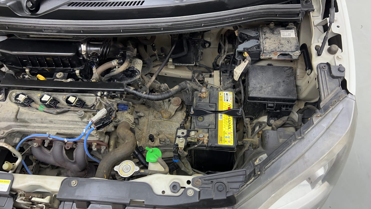 Used 2022 Maruti Suzuki Wagon R 1.0 VXi (O) 1.0 Petrol Manual engine ENGINE LEFT SIDE VIEW