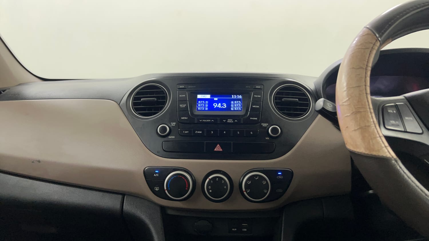 Used 2016 Hyundai Grand i10 Sportz 1.2 Kappa VTVT Petrol Manual interior MUSIC SYSTEM & AC CONTROL VIEW