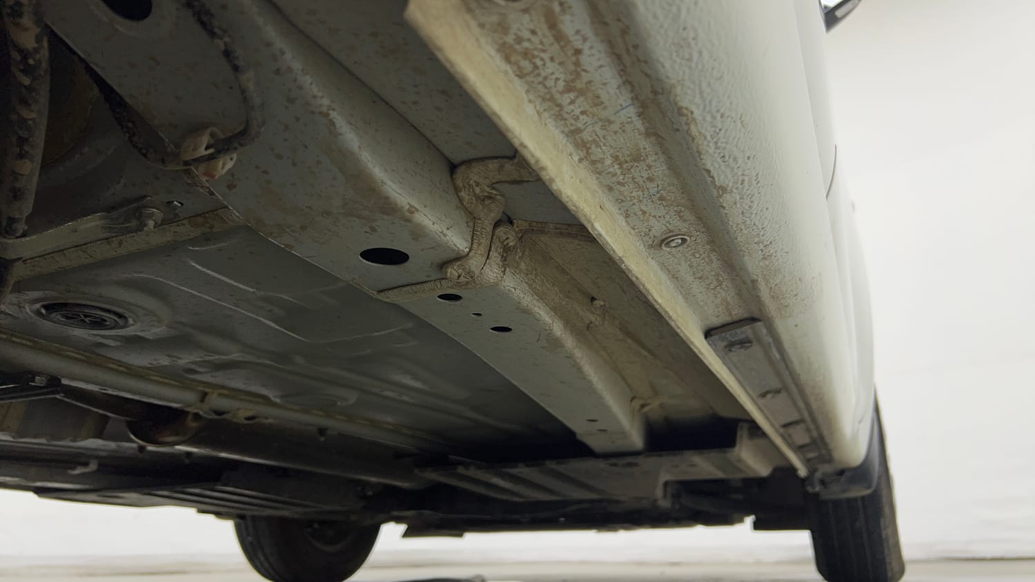 Used 2025 Maruti Suzuki Swift LXi Petrol Manual extra REAR RIGHT UNDERBODY VIEW