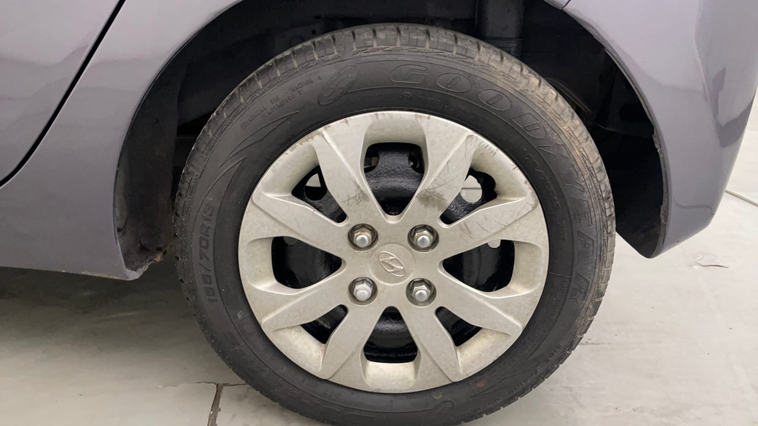 Used 2014 Hyundai Eon Magna Petrol Manual tyres LEFT REAR TYRE RIM VIEW