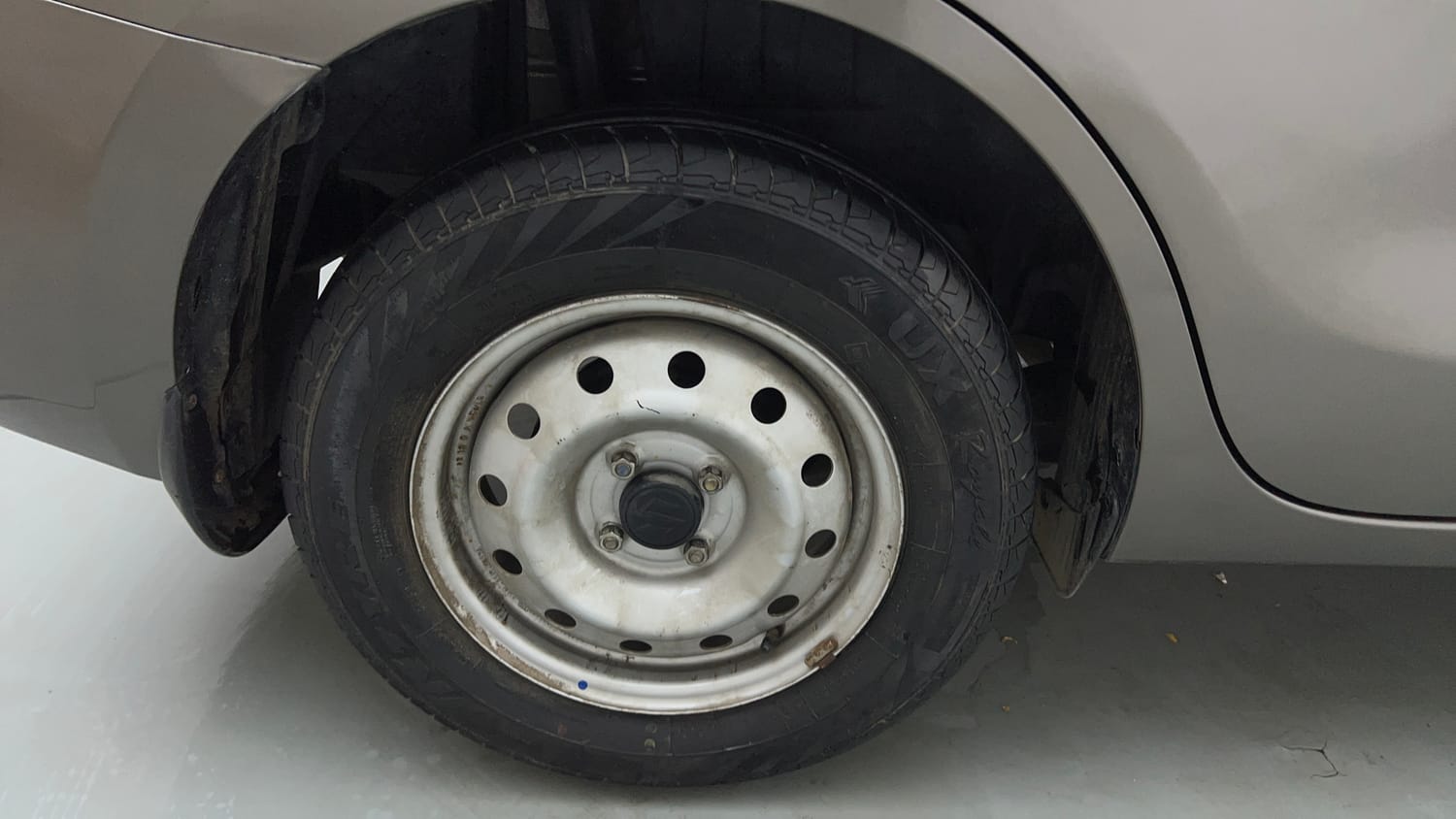 Used 2022 Maruti Suzuki Dzire LXi Petrol Manual tyres RIGHT REAR TYRE RIM VIEW