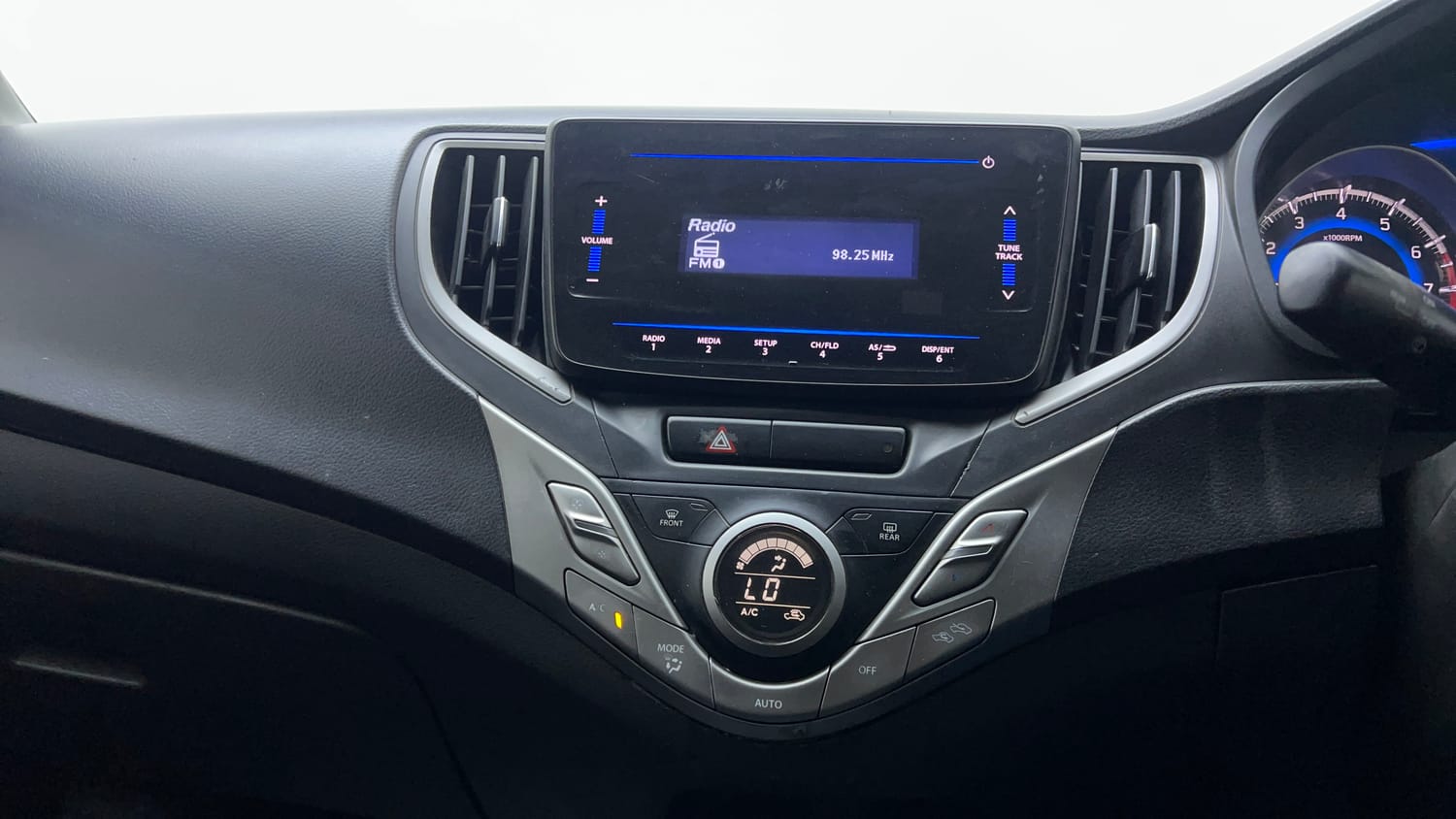 Used 2021 Maruti Suzuki Baleno Delta Petrol+CNG (Outside Fitted) Cng Manual top_features Integrated (in-dash) music system
