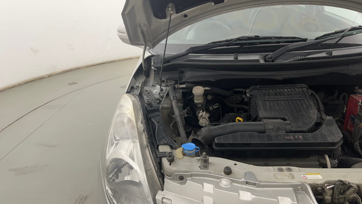 Used 2014 Maruti Suzuki Swift Dzire VXI Petrol Manual engine ENGINE RIGHT SIDE HINGE & APRON VIEW