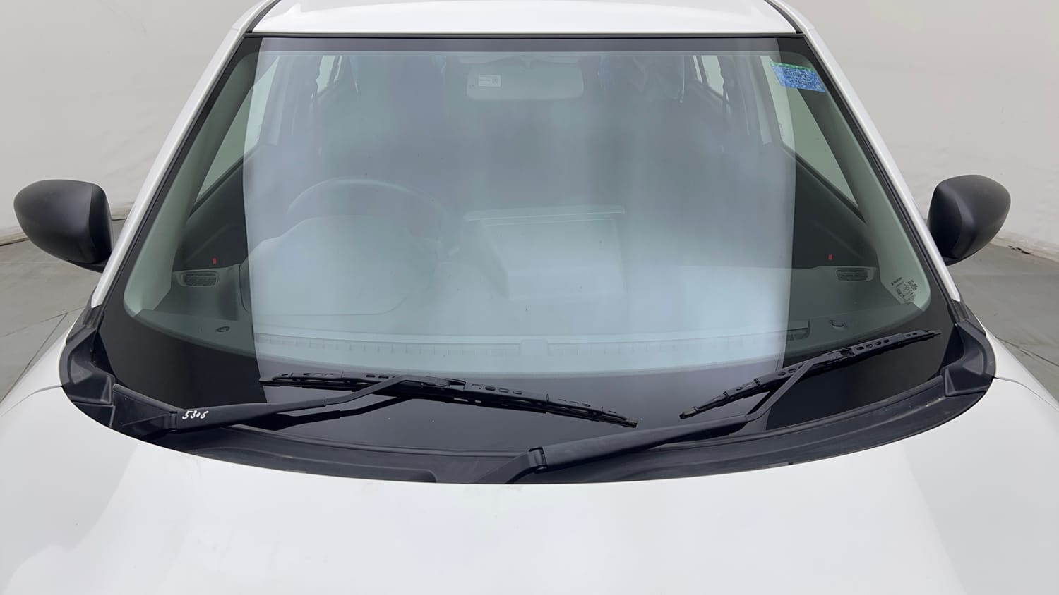 Used 2025 Maruti Suzuki Swift LXi Petrol Manual exterior FRONT WINDSHIELD VIEW