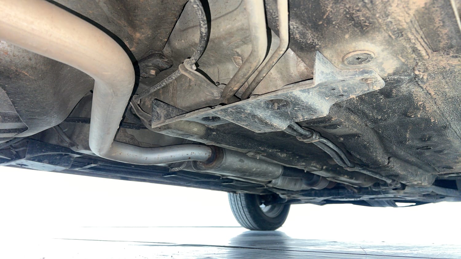 Used 2023 Kia Carens Prestige 1.4 Petrol MT 7 STR Petrol Manual extra REAR RIGHT UNDERBODY VIEW