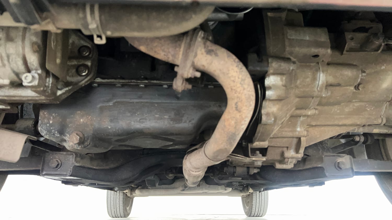 Used 2014 Tata Zest XMS Petrol Petrol Manual extra FRONT LEFT UNDERBODY VIEW