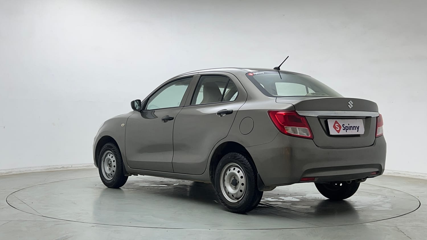 Used 2022 Maruti Suzuki Dzire LXi Petrol Manual exterior LEFT REAR CORNER VIEW