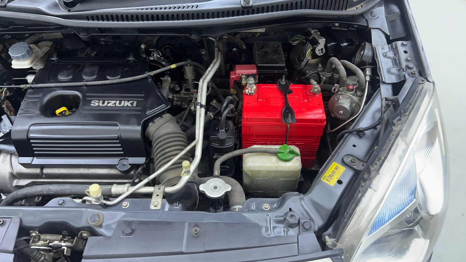 Used 2013 Maruti Suzuki Wagon R 1.0 LXI CNG (outside fitted) Cng Manual engine ENGINE LEFT SIDE VIEW