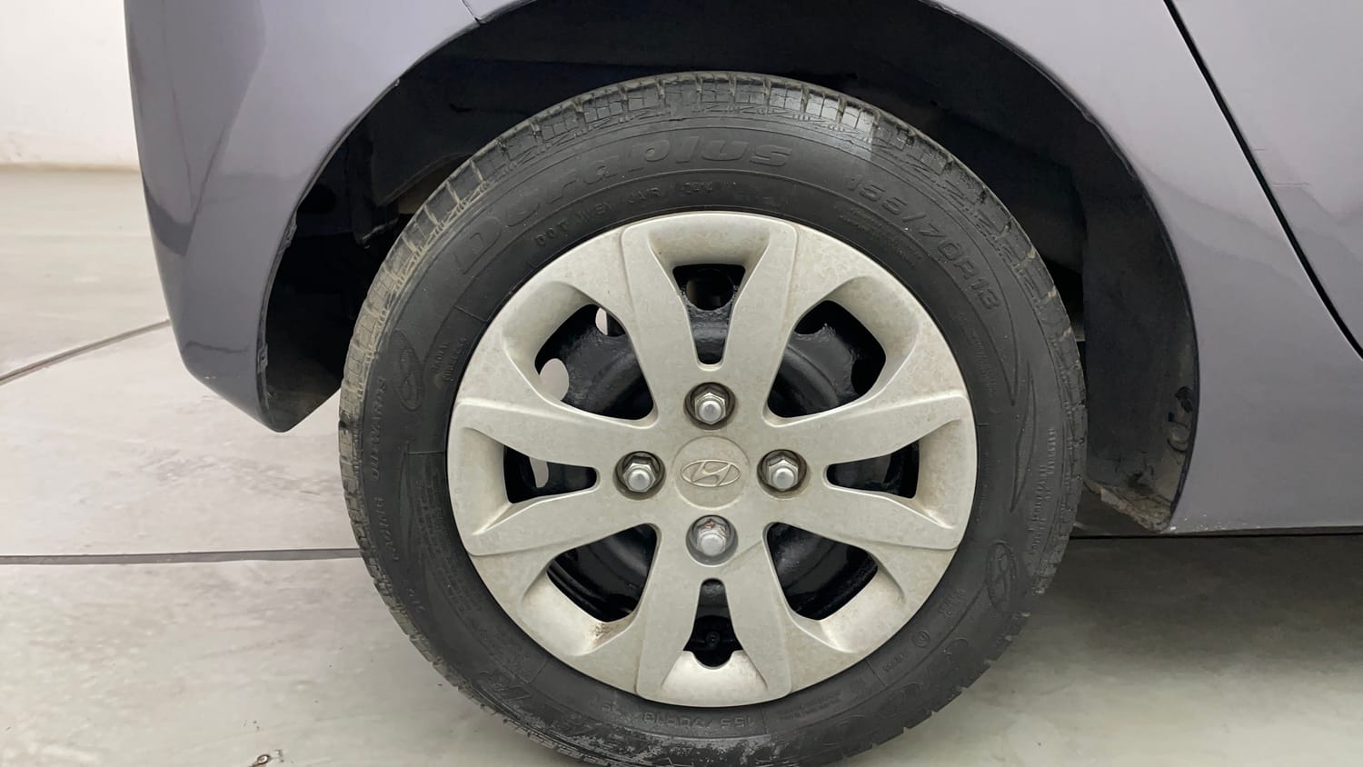 Used 2014 Hyundai Eon Magna Petrol Manual tyres RIGHT REAR TYRE RIM VIEW