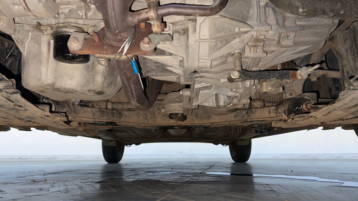 Used 2022 Maruti Suzuki Dzire LXi Petrol Manual extra FRONT LEFT UNDERBODY VIEW