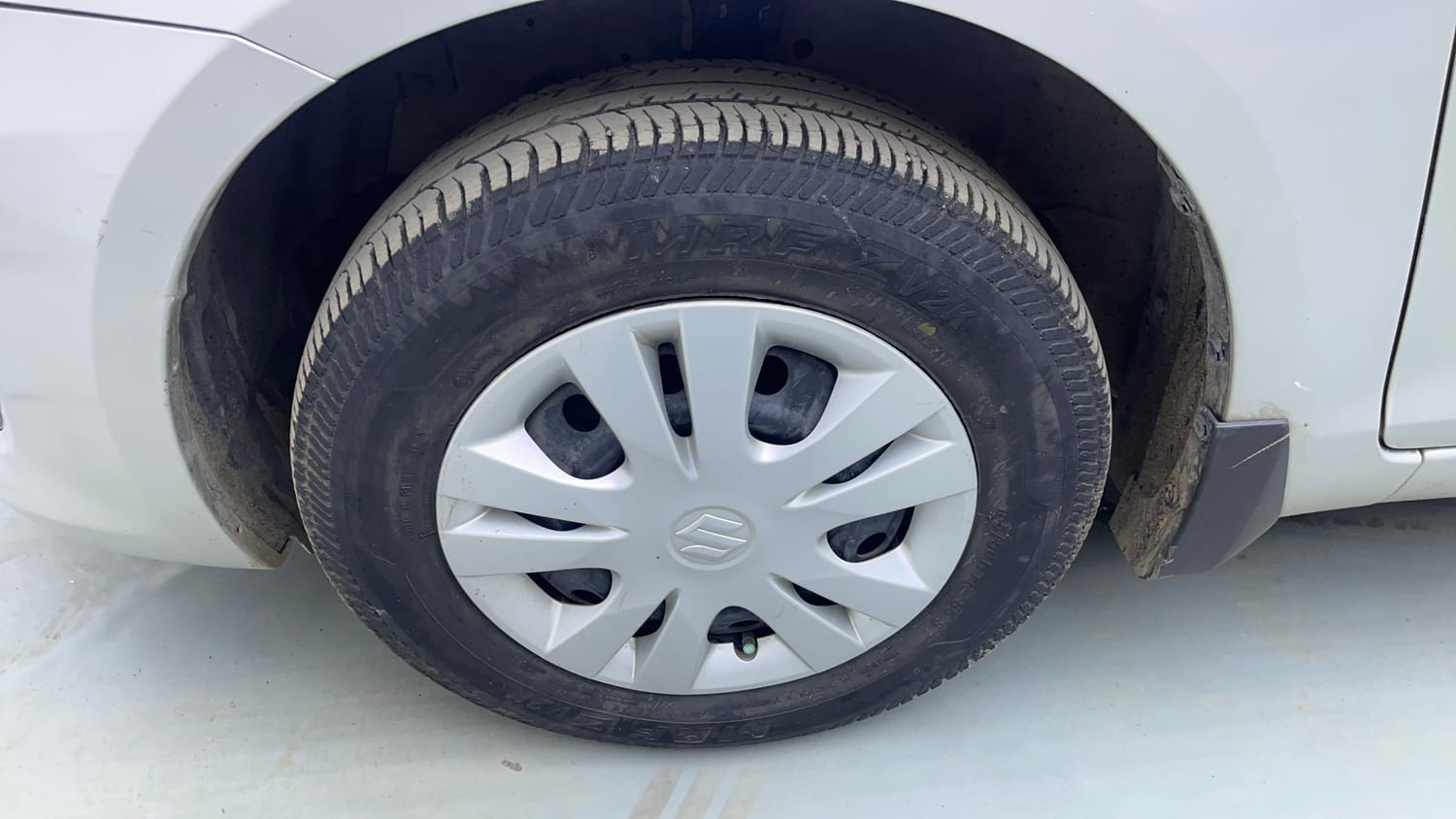 Used 2014 Maruti Suzuki Swift Dzire VXI Petrol Manual tyres LEFT FRONT TYRE RIM VIEW
