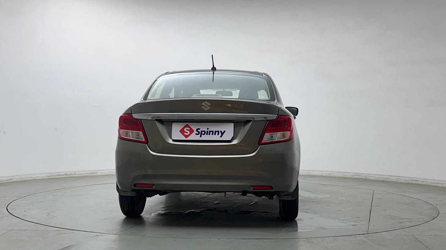 Used 2022 Maruti Suzuki Dzire LXi Petrol Manual exterior BACK VIEW