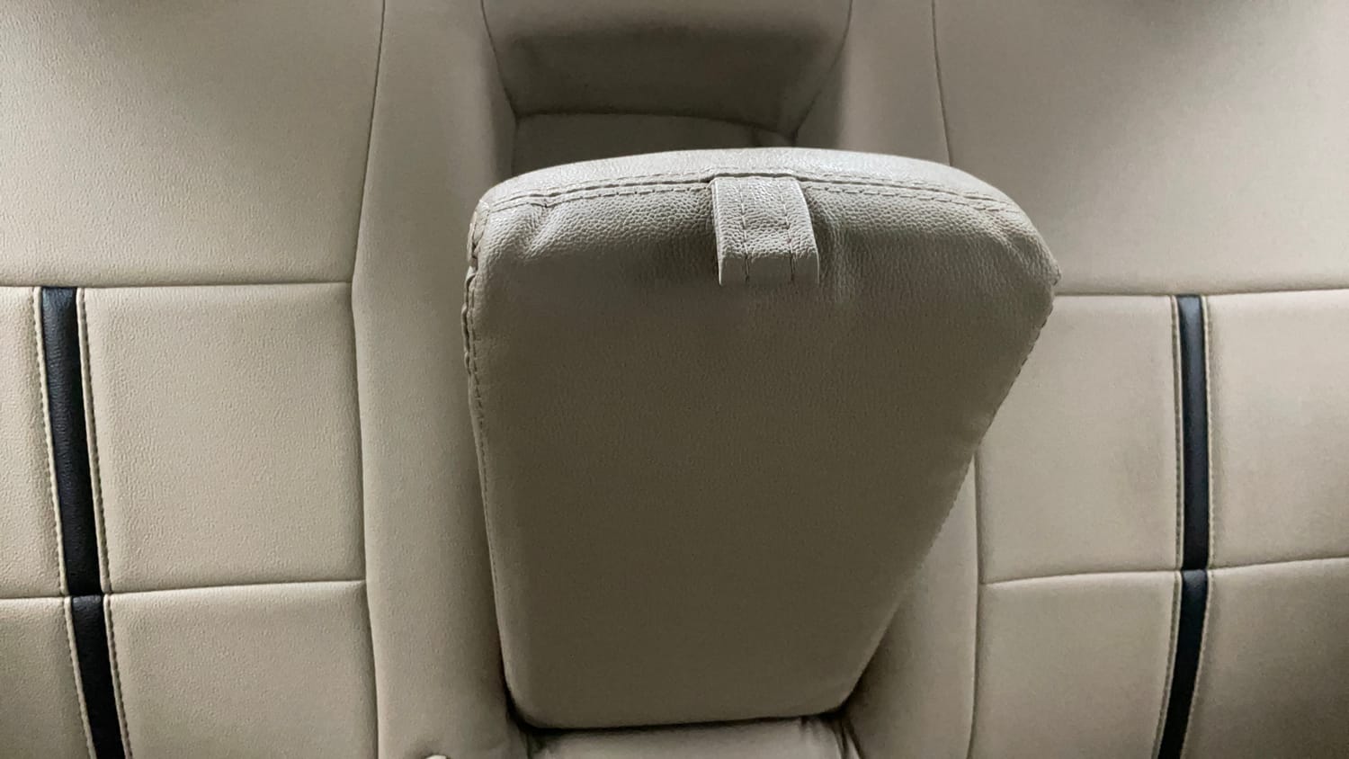 Used 2016 Maruti Suzuki Swift Dzire VXI Petrol Manual top_features Folding table in the rear