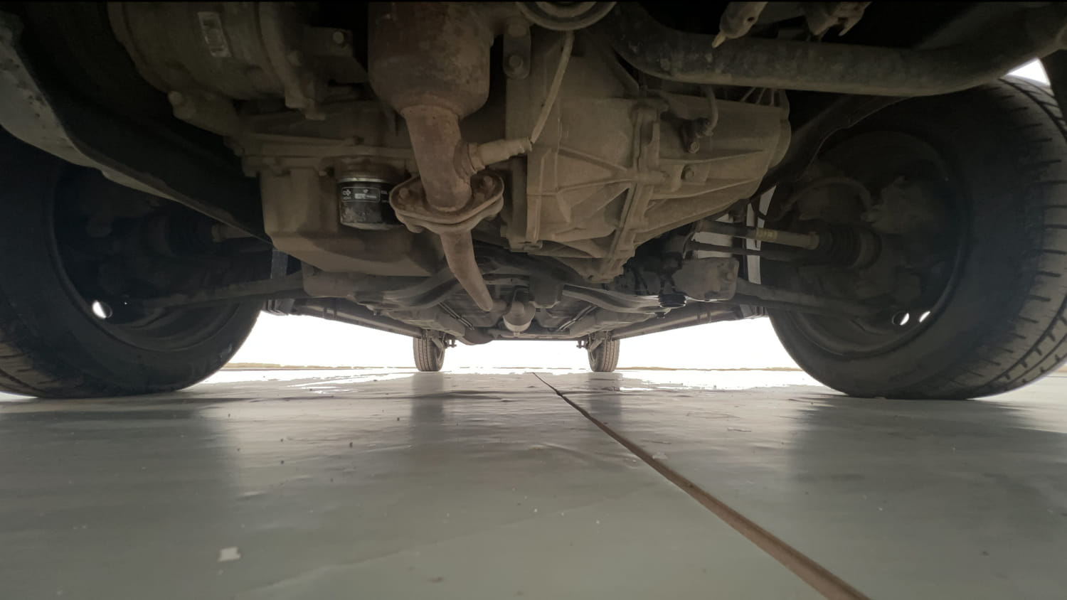 Used 2019 Maruti Suzuki Wagon R 1.0 VXI AMT Petrol Automatic extra FRONT LEFT UNDERBODY VIEW
