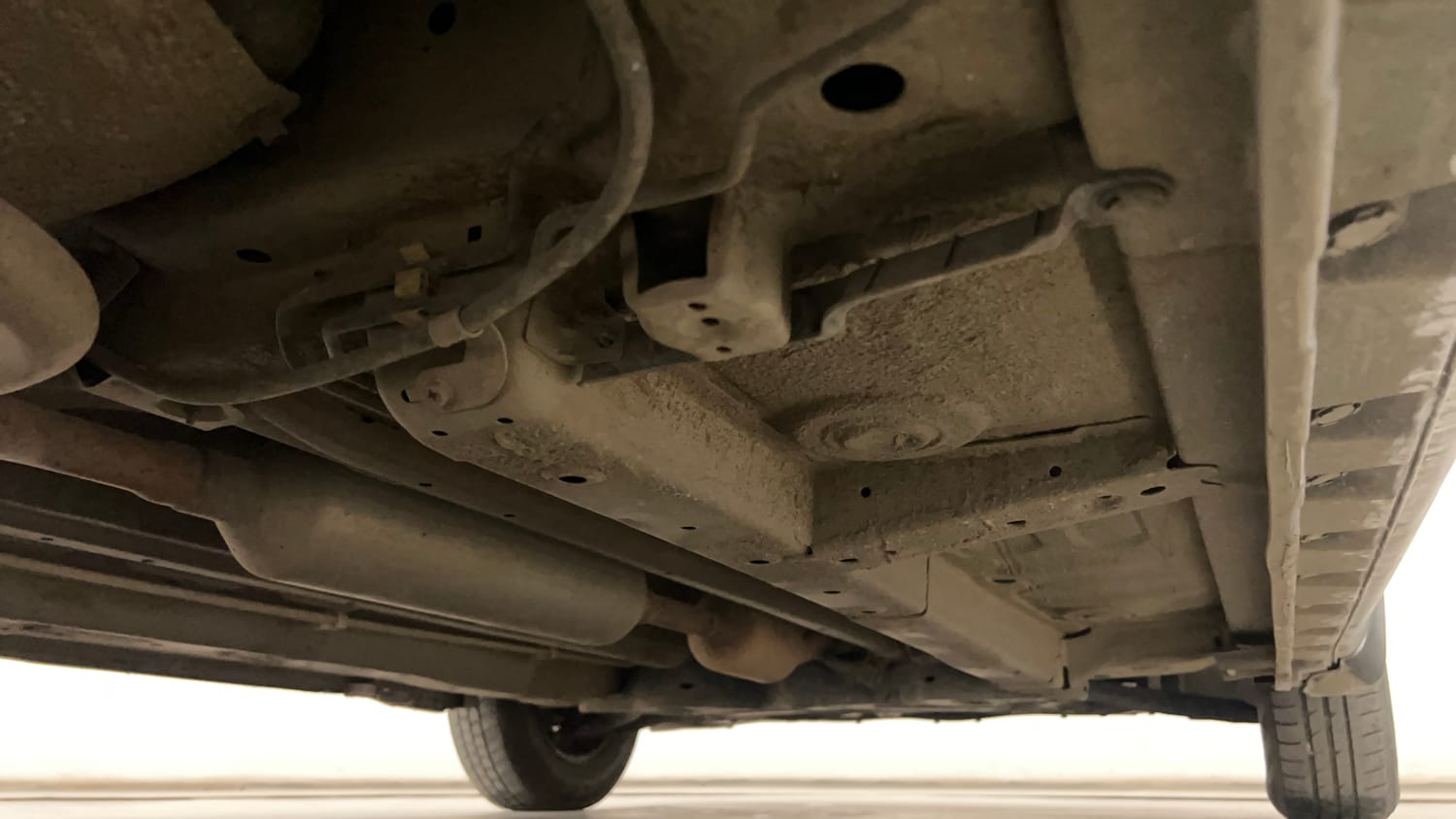Used 2015 Maruti Suzuki Swift Dzire VXI Petrol Manual extra REAR RIGHT UNDERBODY VIEW