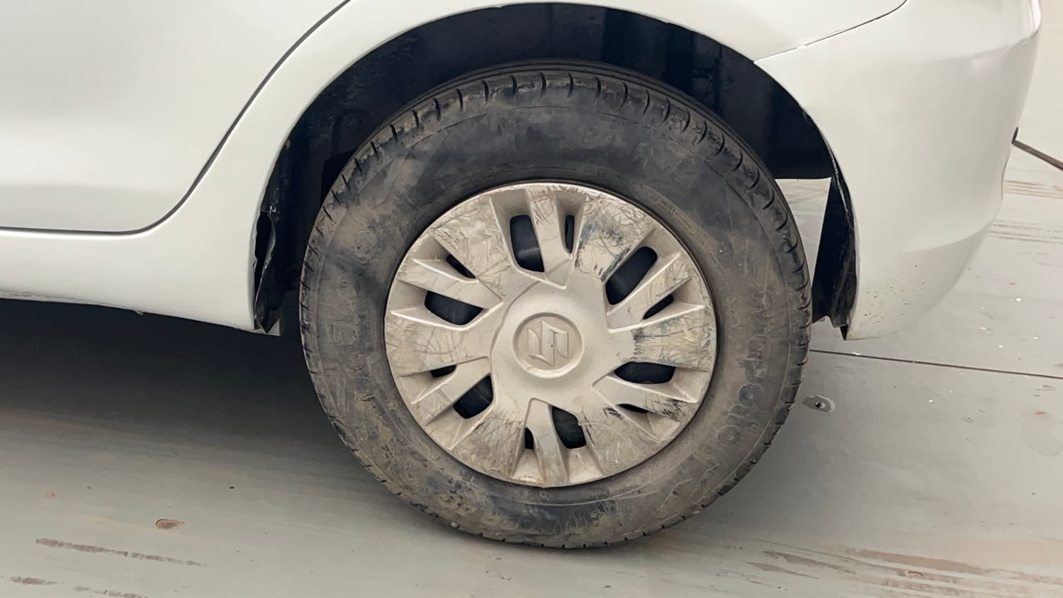 Used 2015 Maruti Suzuki Swift VXi Petrol Manual tyres LEFT REAR TYRE RIM VIEW