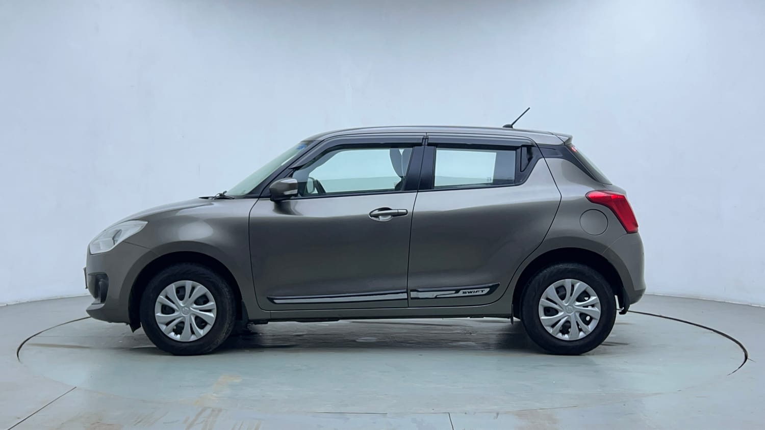 Used 2022 Maruti Suzuki Swift VXi Petrol Manual exterior LEFT SIDE VIEW