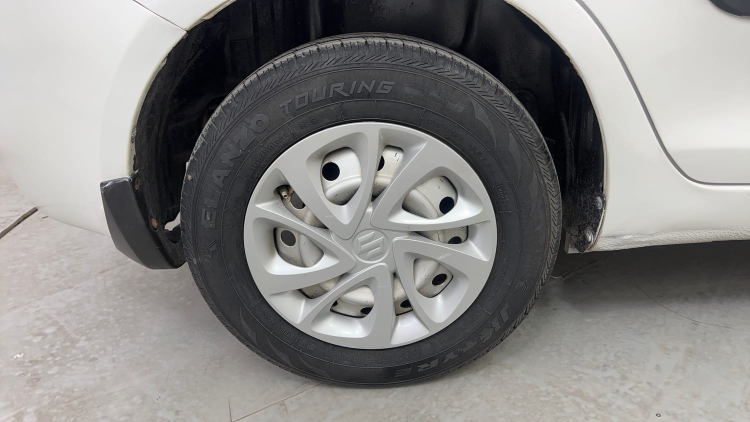 Used 2012 Maruti Suzuki Swift Dzire LXI Petrol Manual tyres RIGHT REAR TYRE RIM VIEW