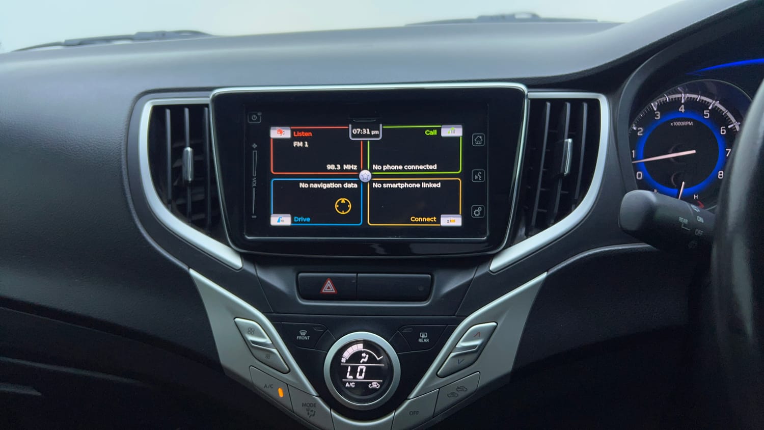 Used 2018 Maruti Suzuki Baleno Alpha 1.2 Petrol Manual top_features Integrated (in-dash) music system