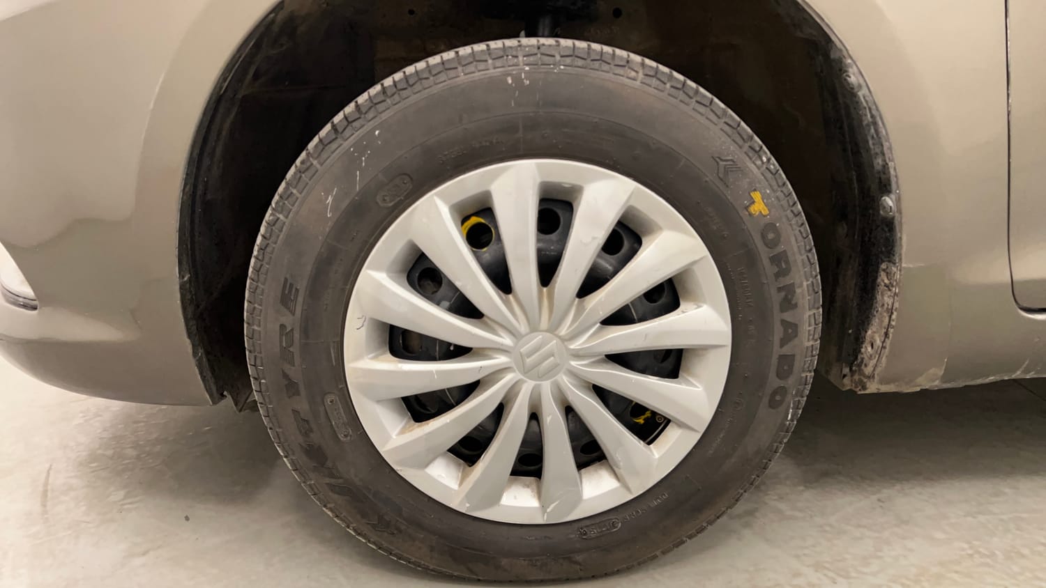 Used 2015 Maruti Suzuki Swift Dzire VXI Petrol Manual tyres LEFT FRONT TYRE RIM VIEW