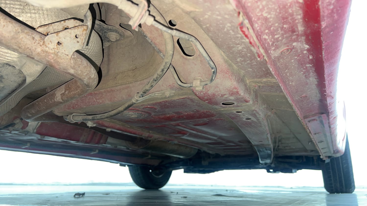 Used 2022 Maruti Suzuki Swift LXi Petrol Manual extra REAR RIGHT UNDERBODY VIEW