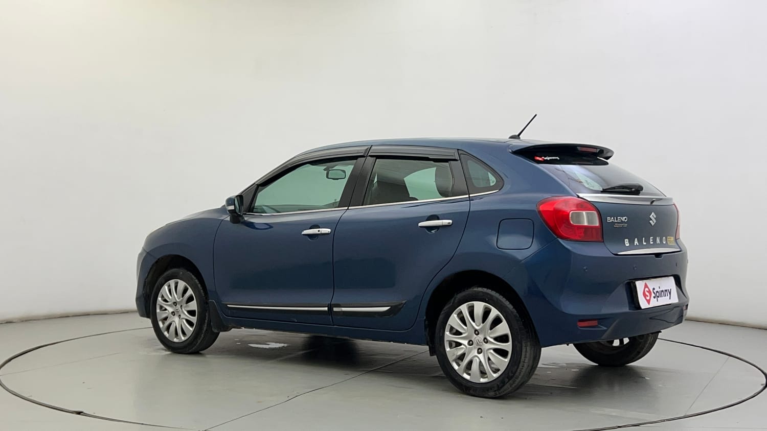 Used 2016 Maruti Suzuki Baleno Zeta 1.2 Petrol Manual exterior LEFT REAR CORNER VIEW