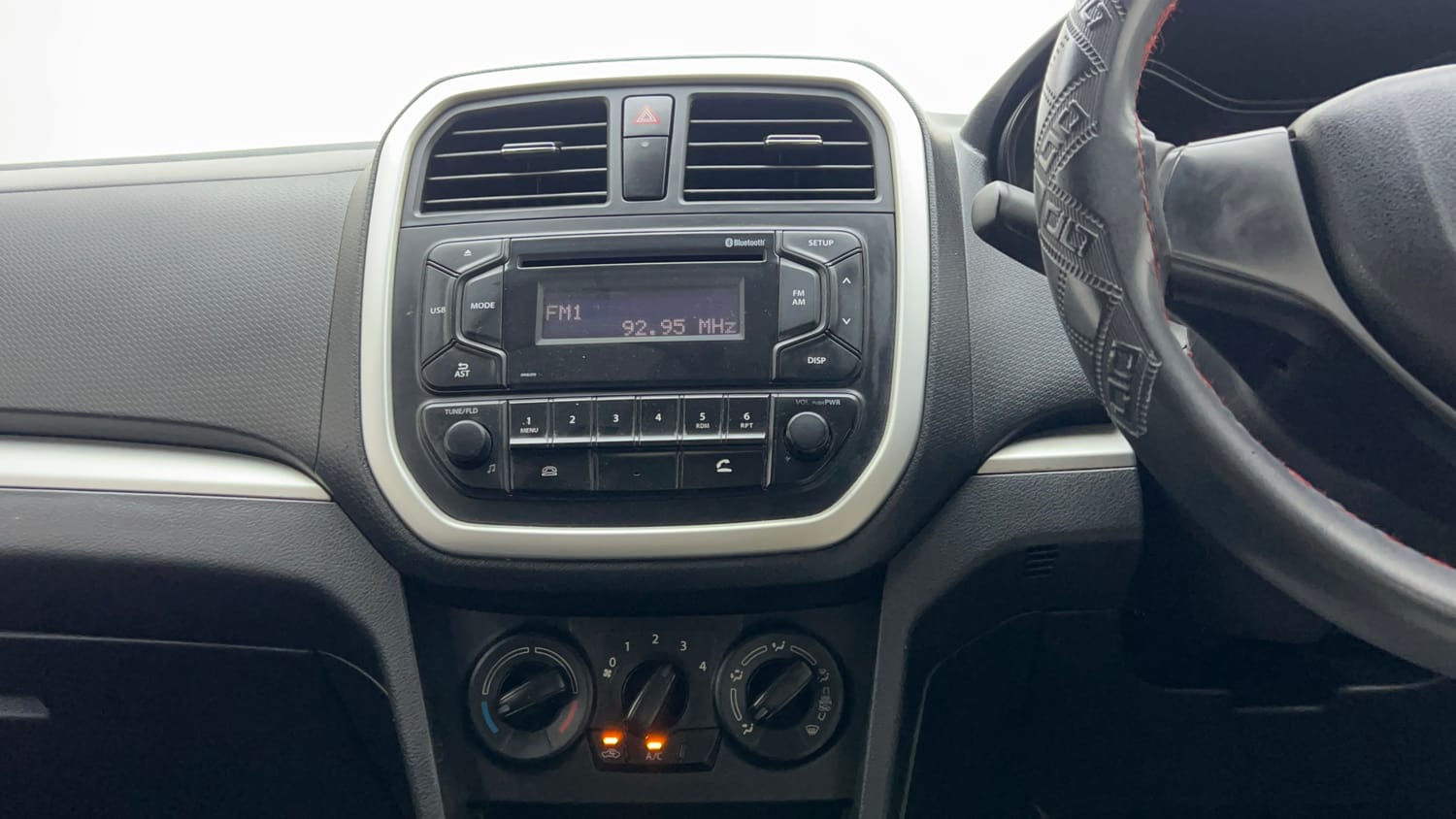 Used 2021 maruti-suzuki Vitara Brezza LXi Petrol Manual interior MUSIC SYSTEM & AC CONTROL VIEW