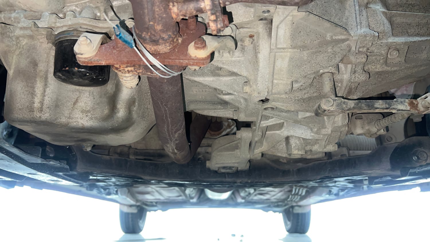 Used 2022 Maruti Suzuki Swift LXi Petrol Manual extra FRONT LEFT UNDERBODY VIEW