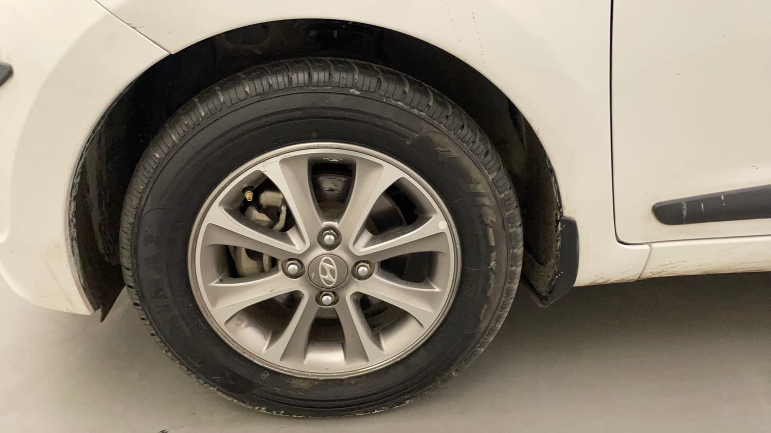 Used 2015 Hyundai Grand i10 Asta 1.2 Kappa VTVT (O) Petrol Manual tyres LEFT FRONT TYRE RIM VIEW