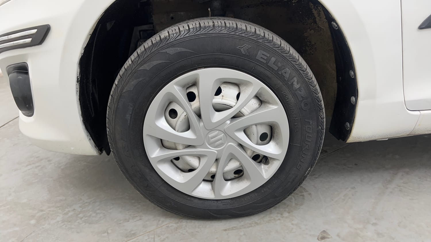 Used 2012 Maruti Suzuki Swift Dzire LXI Petrol Manual tyres LEFT FRONT TYRE RIM VIEW