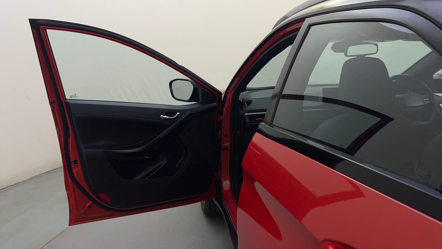 Used 2023 Tata Nexon Fearless Plus S 1.2 Revotron Petrol 7DCA DT Petrol Automatic interior LEFT FRONT DOOR OPEN VIEW