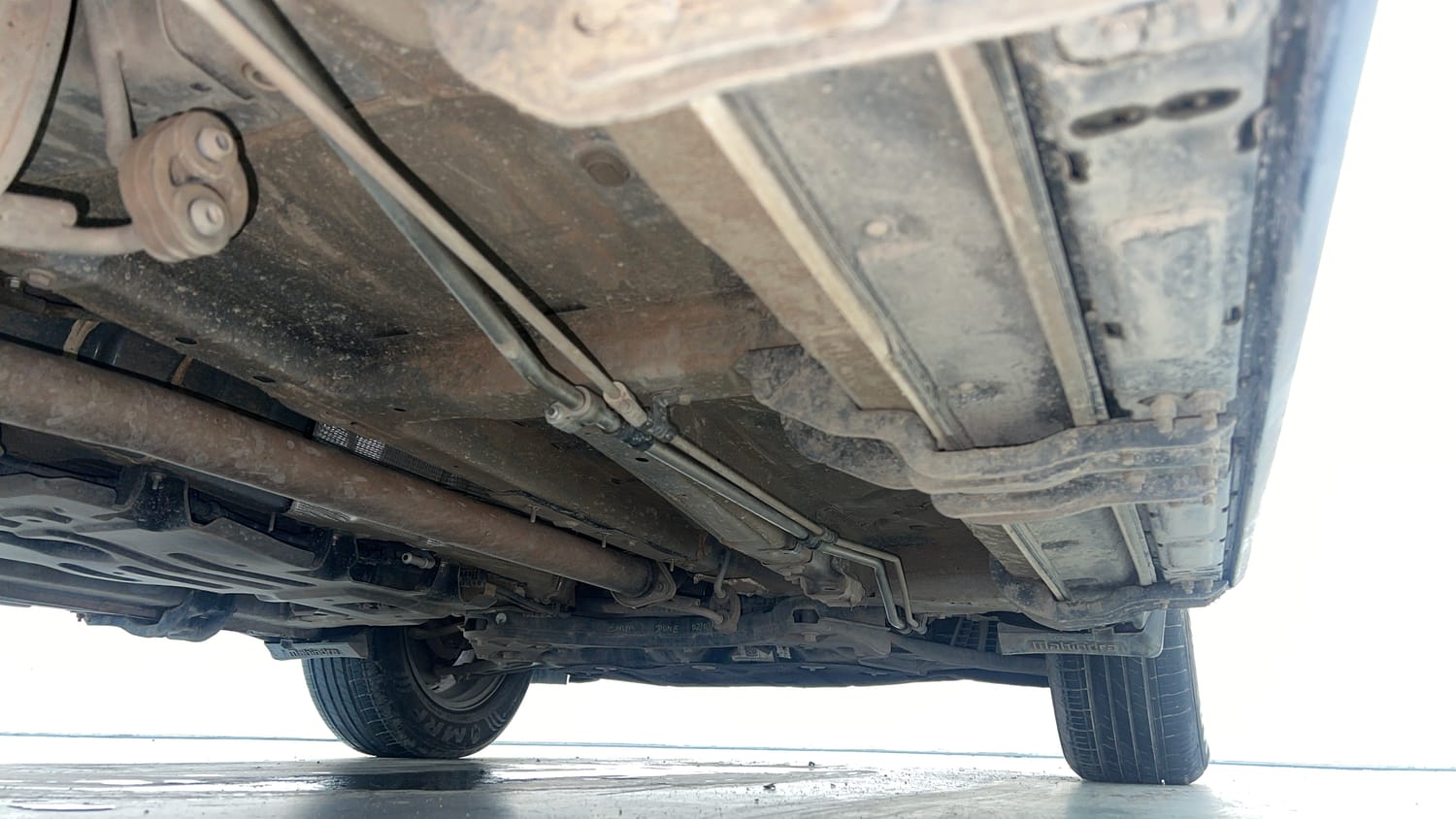 Used 2025 Mahindra XUV700 AX5 Petrol MT 7 STR Petrol Manual extra REAR RIGHT UNDERBODY VIEW