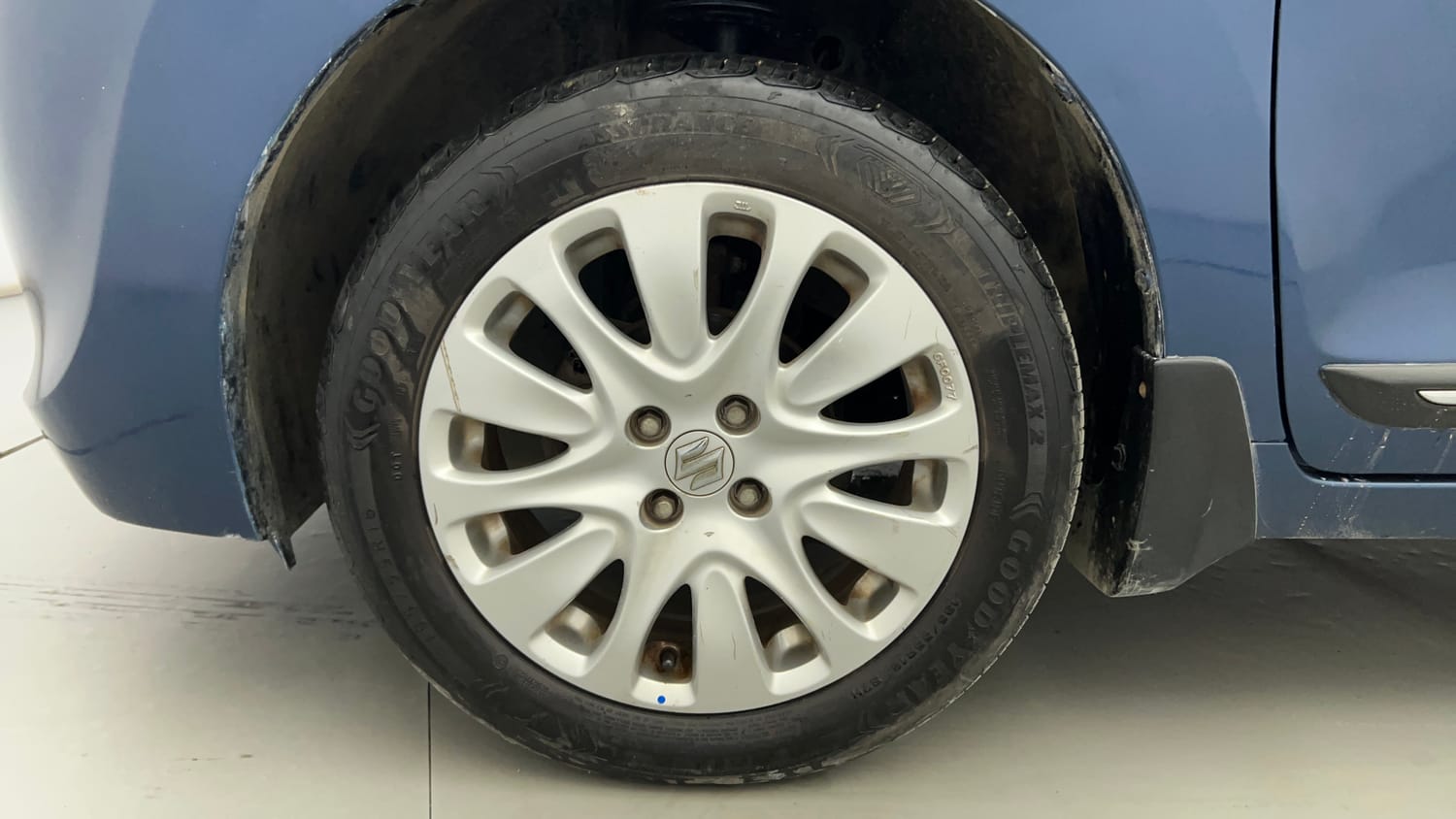 Used 2016 Maruti Suzuki Baleno Zeta 1.2 Petrol Manual tyres LEFT FRONT TYRE RIM VIEW