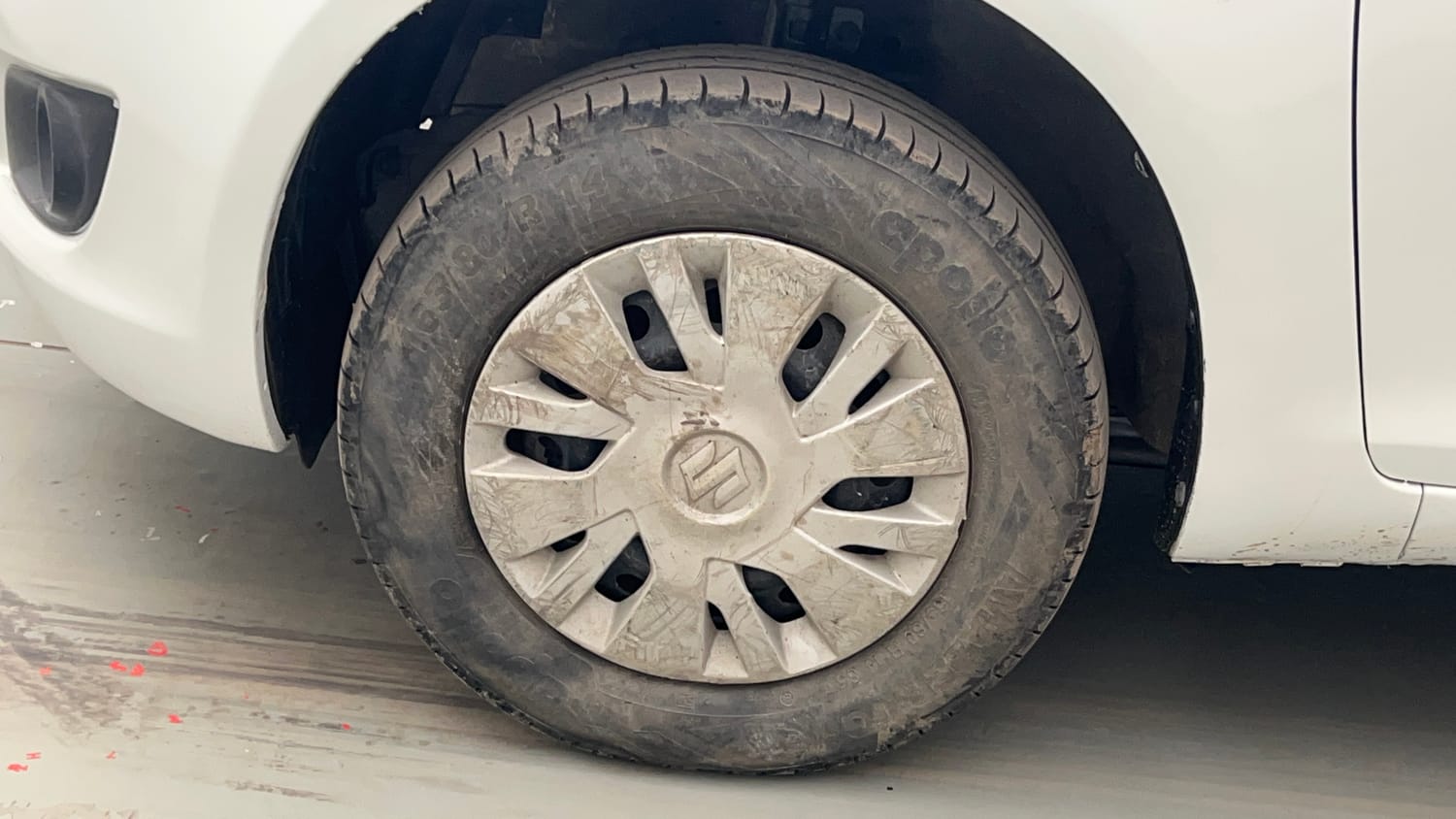 Used 2015 Maruti Suzuki Swift VXi Petrol Manual tyres LEFT FRONT TYRE RIM VIEW