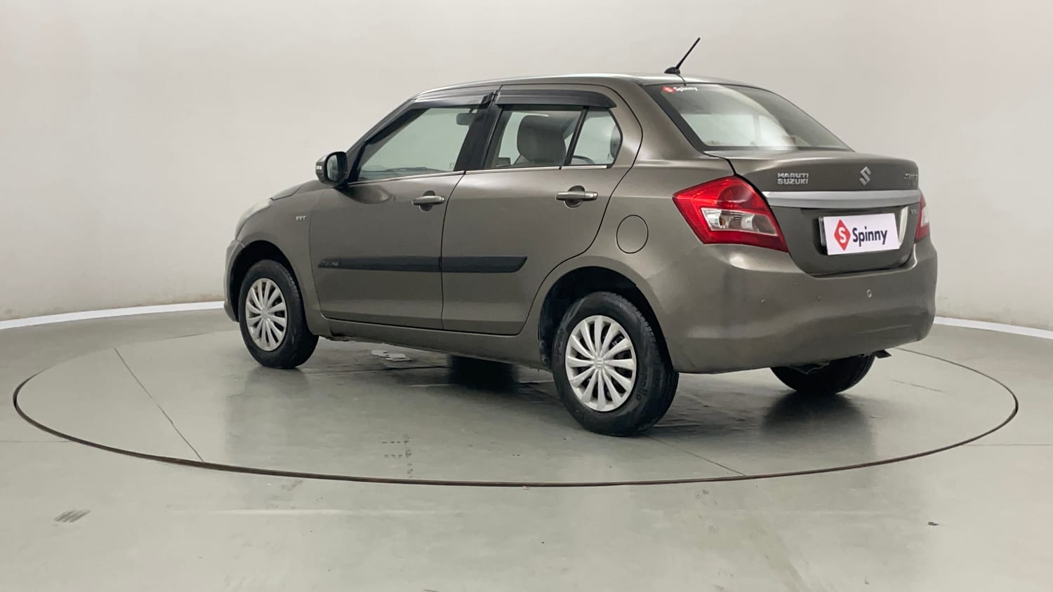 Used 2016 Maruti Suzuki Swift Dzire VXI Petrol Manual exterior LEFT REAR CORNER VIEW