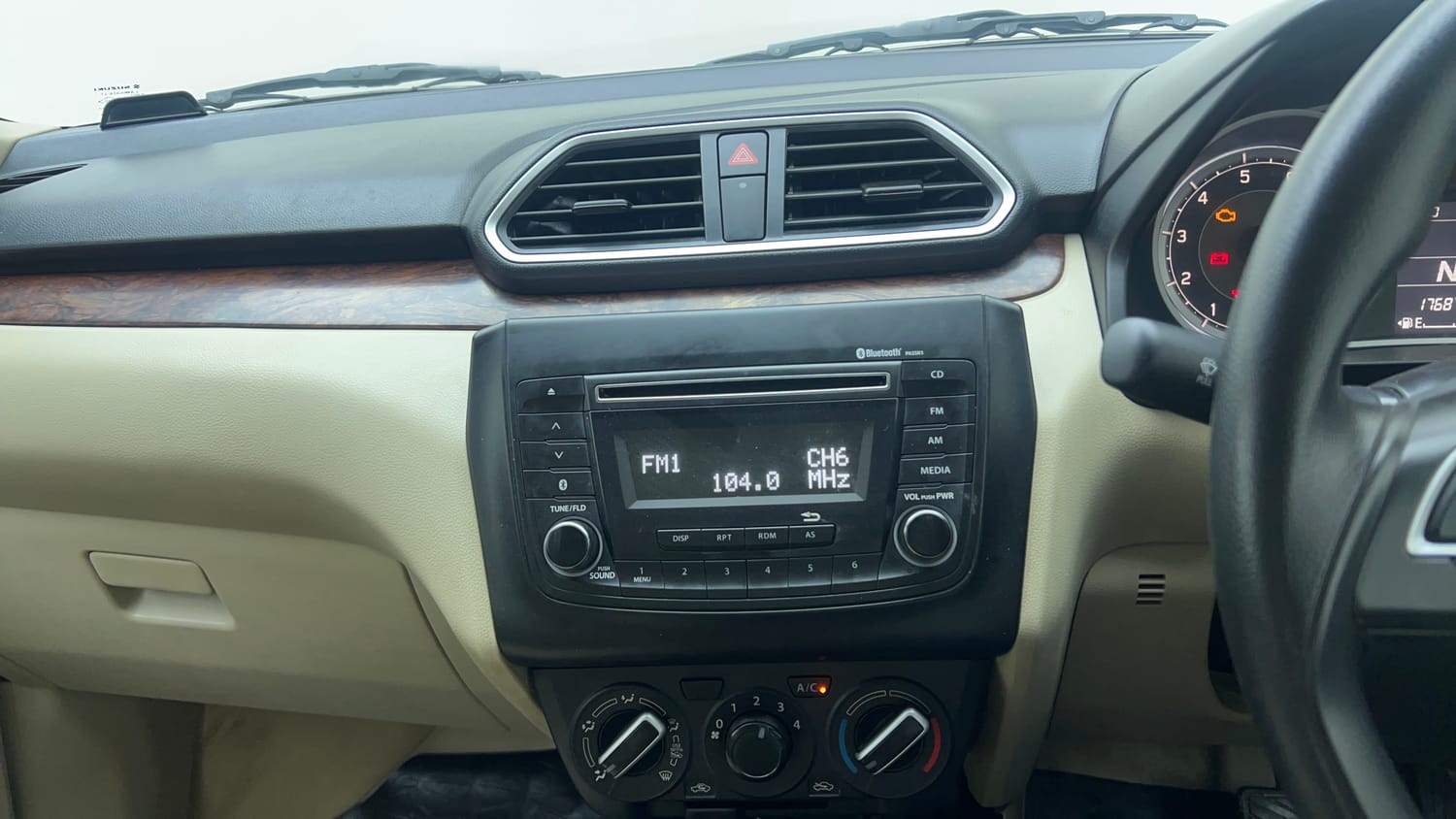 Used 2019 Maruti Suzuki Dzire VXi AMT Petrol Automatic top_features Integrated (in-dash) music system