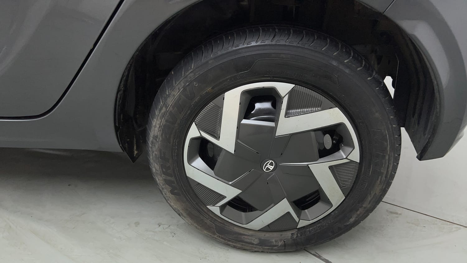 Used 2026 Tata Tiago EV XT Medium Range Electric Automatic tyres LEFT REAR TYRE RIM VIEW