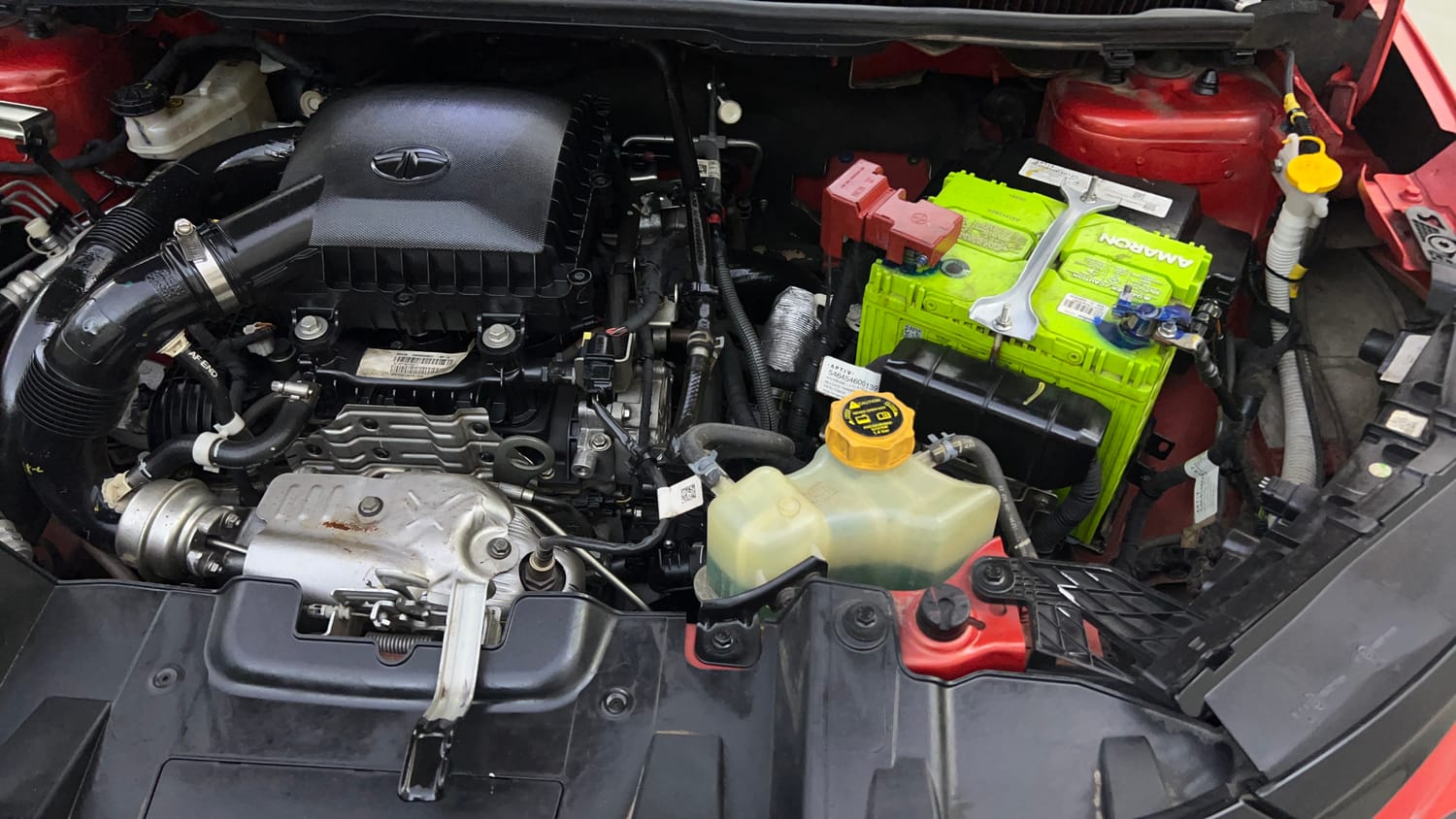 Used 2023 Tata Nexon Fearless Plus S 1.2 Revotron Petrol 7DCA DT Petrol Automatic engine ENGINE LEFT SIDE VIEW