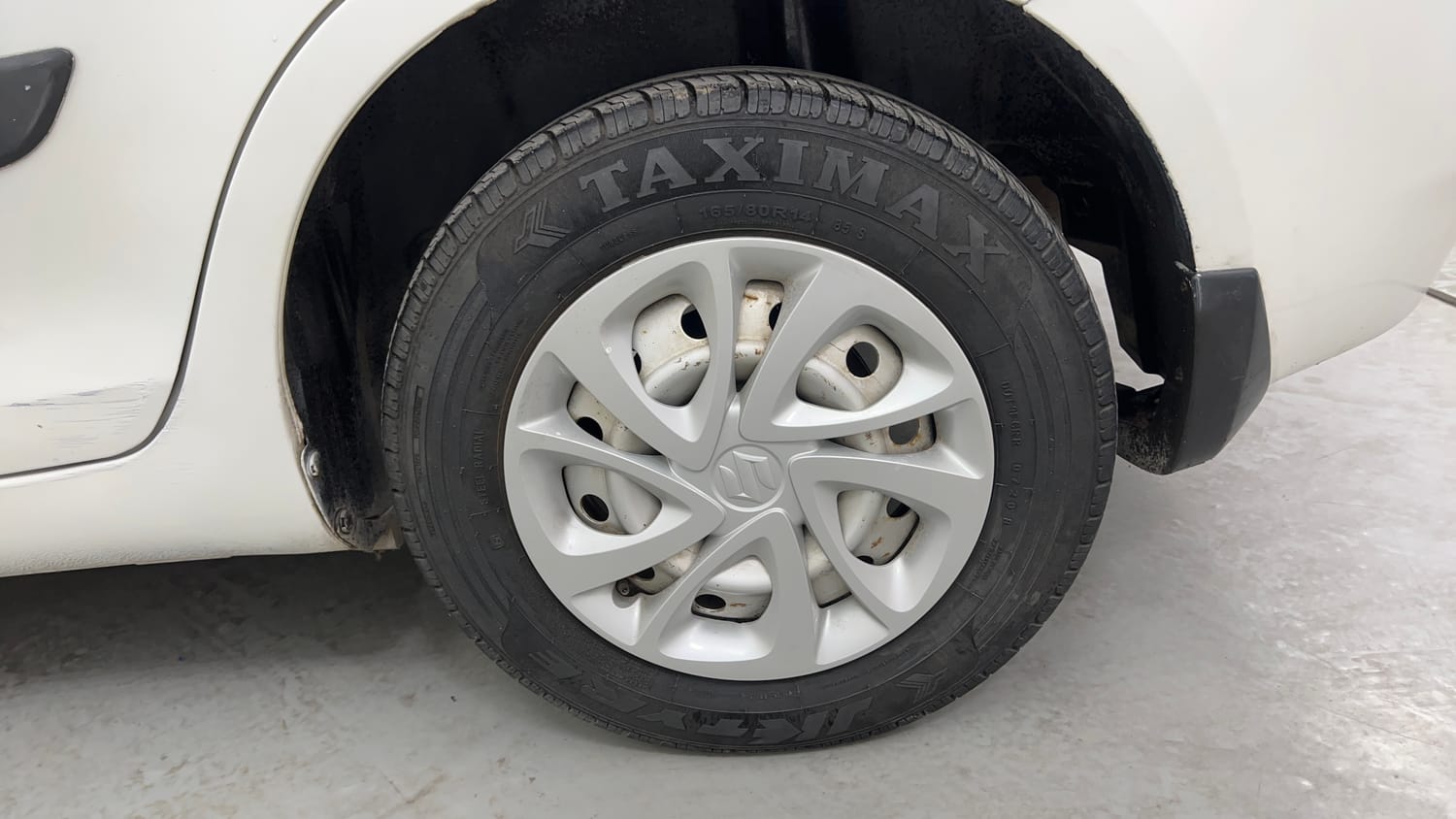 Used 2012 Maruti Suzuki Swift Dzire LXI Petrol Manual tyres LEFT REAR TYRE RIM VIEW