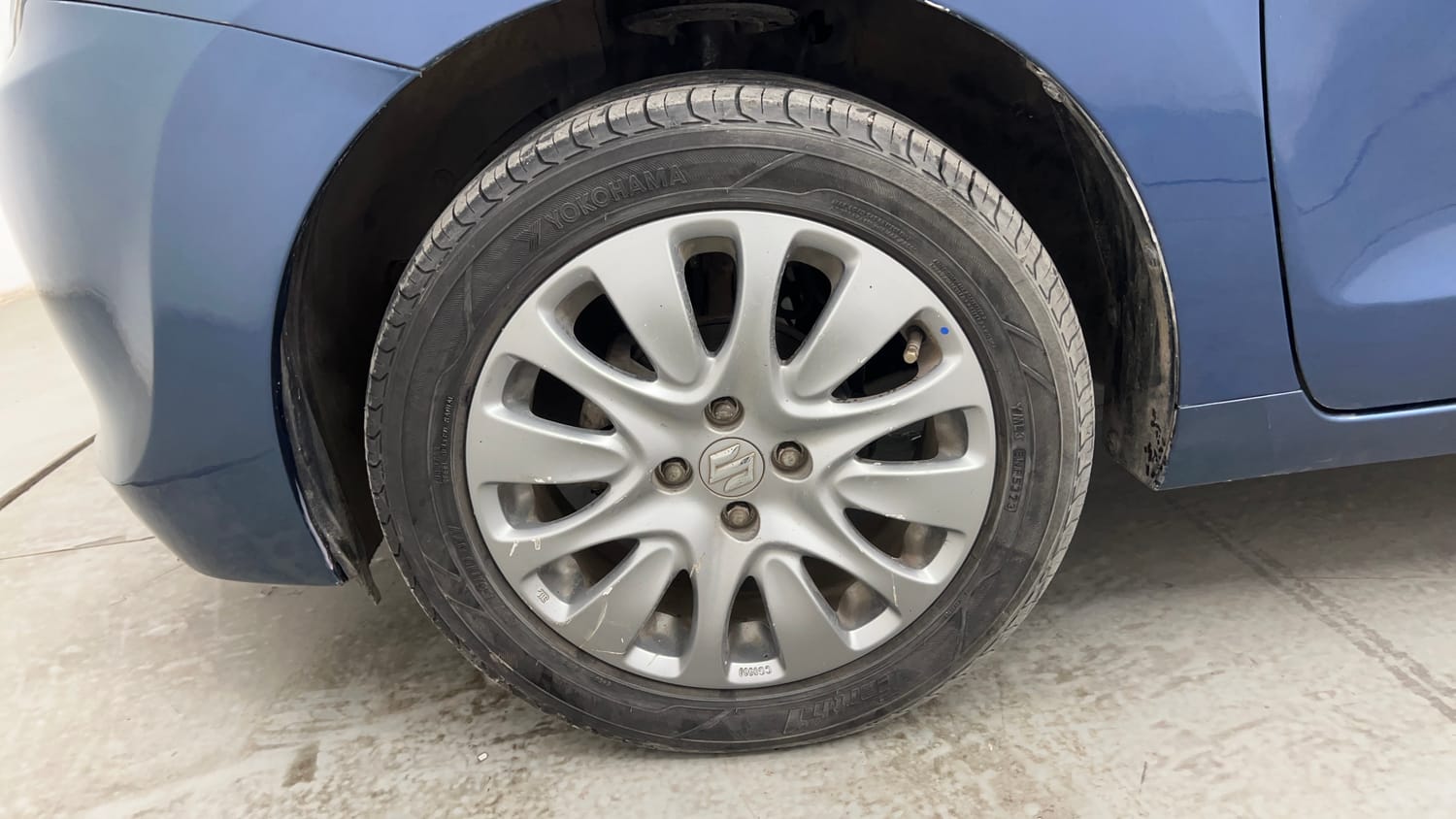 Used 2016 Maruti Suzuki Baleno Zeta 1.2 Petrol Manual tyres LEFT FRONT TYRE RIM VIEW